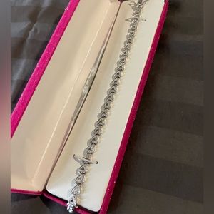 Beautiful sterling silver diamond heart shaped bracelet.